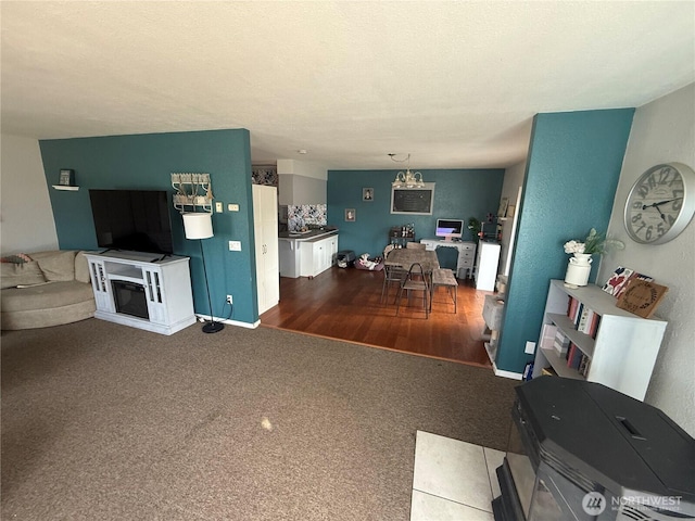 living room featuring dark carpet