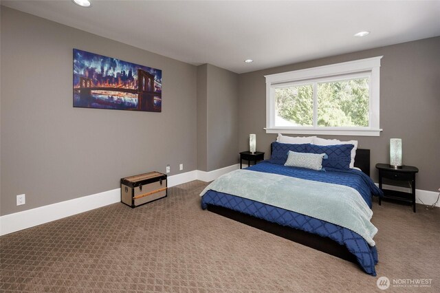 carpeted bedroom featuring baseboards and recessed lighting