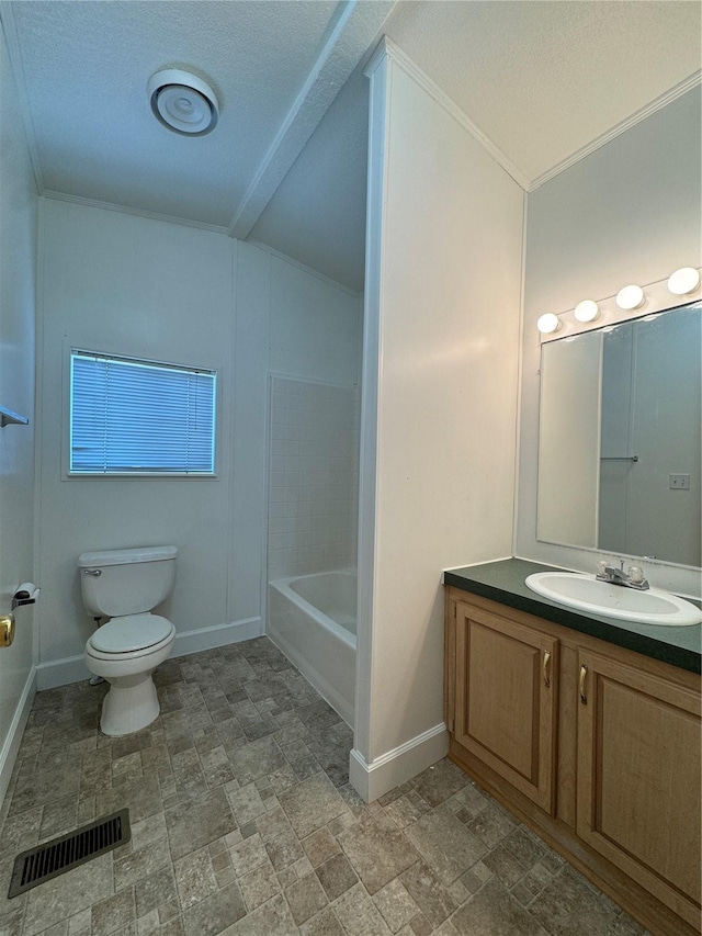 181A-B Beacon Hill Dr, Longview, WA 98632 - bathroom featuring toilet, vanity, baseboards, stone finish floors, and ornamental molding