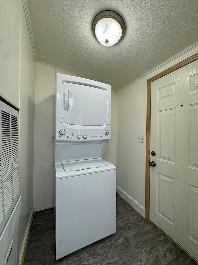 181A-B Beacon Hill Dr, Longview, WA 98632 - laundry room featuring estacked washer and dryer, a textured ceiling, baseboards, and a heating unit