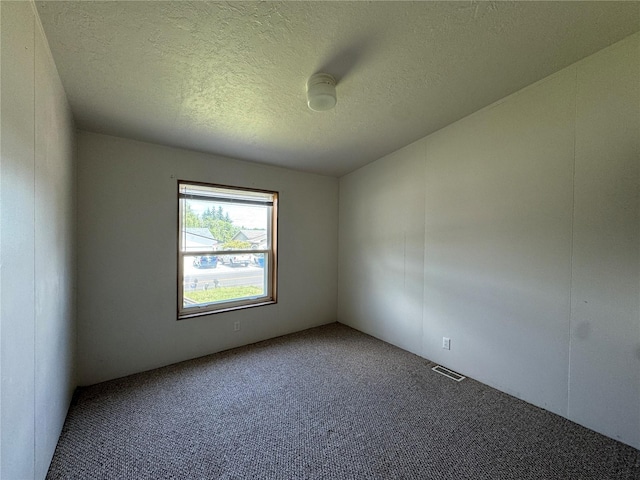 181A-B Beacon Hill Dr, Longview, WA 98632 - carpeted empty room featuring a textured ceiling