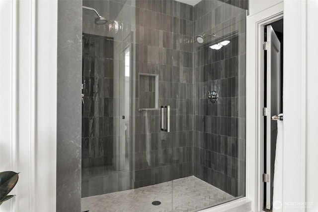 full bathroom featuring a shower stall