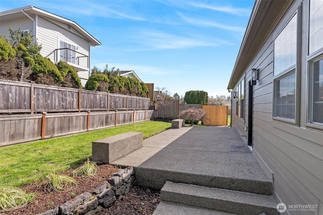 exterior space with a fenced backyard