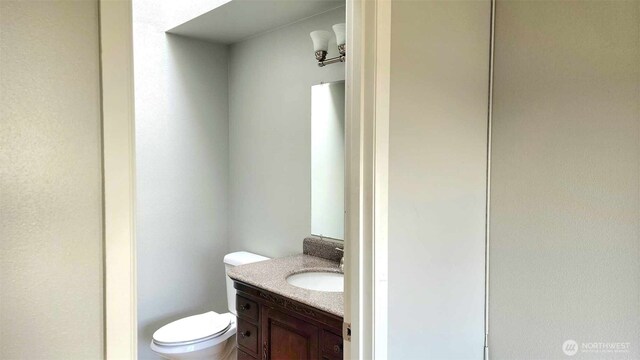 485 SW Bayshore Dr Unit C301, Oak Harbor, WA 98277 - bathroom with vanity and toilet