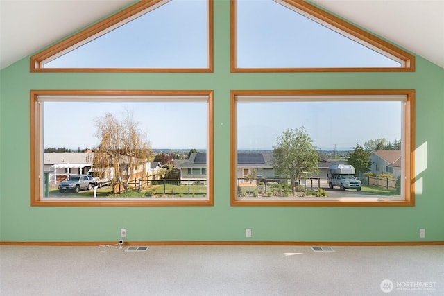 305 W Eunice St, Sequim, WA 98382 - empty room with visible vents, carpet, and lofted ceiling