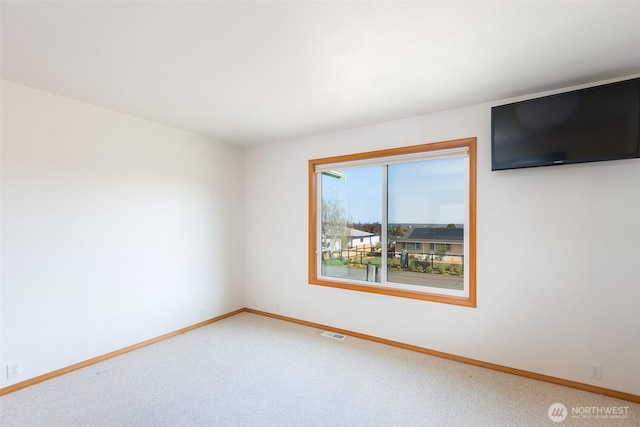 305 W Eunice St, Sequim, WA 98382 - carpeted empty room with visible vents and baseboards
