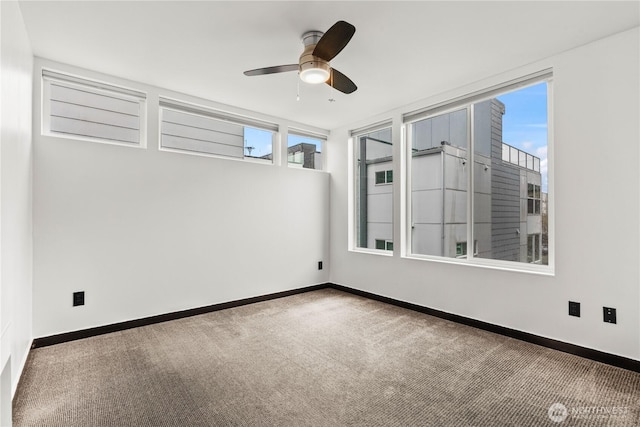 2620 SW Nevada St, Seattle, WA 98126 - carpeted empty room featuring ceiling fan and baseboards