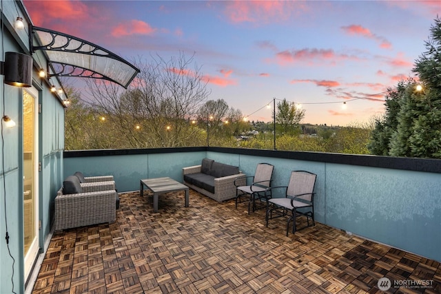 2620 SW Nevada St, Seattle, WA 98126 - patio terrace at dusk with outdoor lounge area