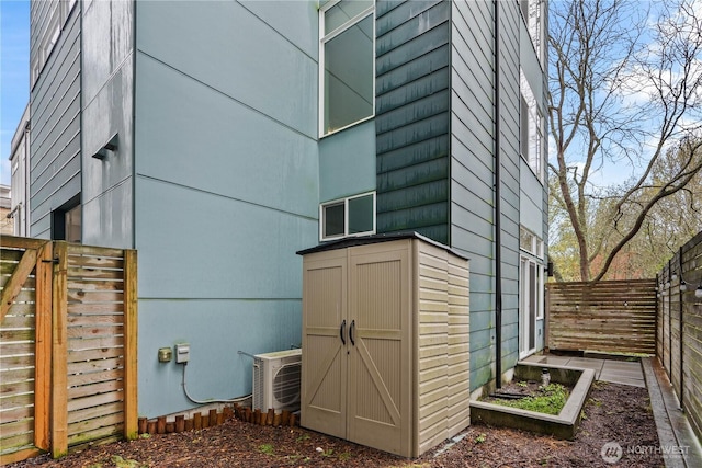 2620 SW Nevada St, Seattle, WA 98126 - view of side of home with ac unit and fence
