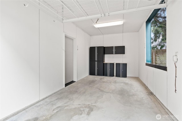 2620 SW Nevada St, Seattle, WA 98126 - interior space featuring concrete flooring