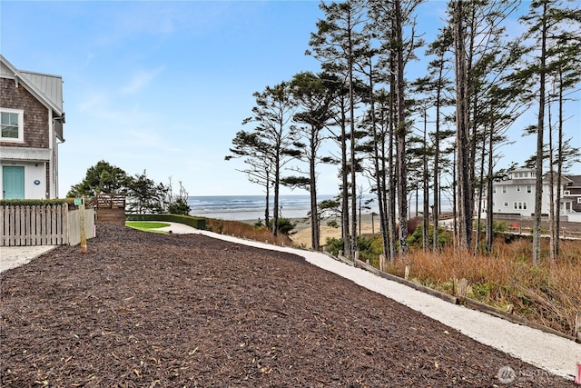 78 Pacifica Ln, Pacific Beach, WA 98571 - view of yard with a water view and fence