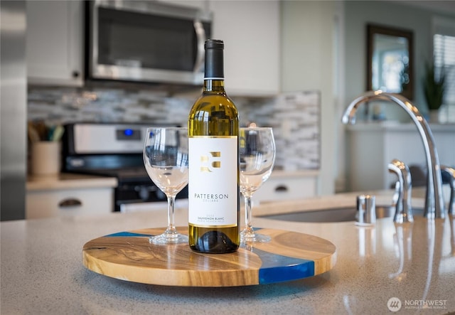 78 Pacifica Ln, Pacific Beach, WA 98571 - room details with a sink and stainless steel appliances