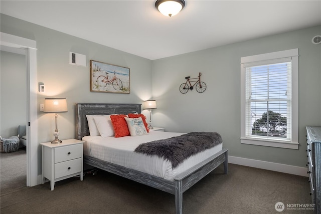 78 Pacifica Ln, Pacific Beach, WA 98571 - bedroom featuring baseboards, dark carpet, and visible vents