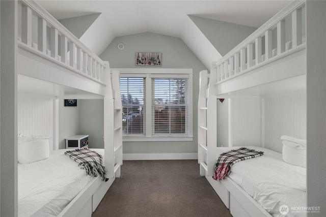 78 Pacifica Ln, Pacific Beach, WA 98571 - bedroom with baseboards, dark colored carpet, and lofted ceiling