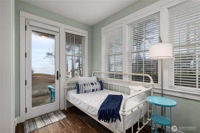78 Pacifica Ln, Pacific Beach, WA 98571 - bedroom with access to outside and wood finished floors