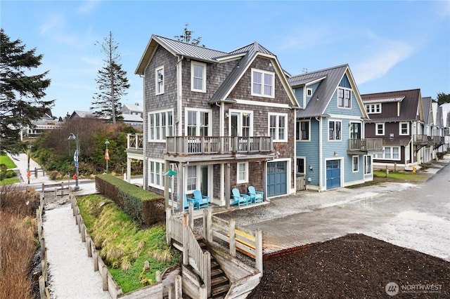 78 Pacifica Ln, Pacific Beach, WA 98571 - view of front of house featuring a residential view, metal roof, and a standing seam roof