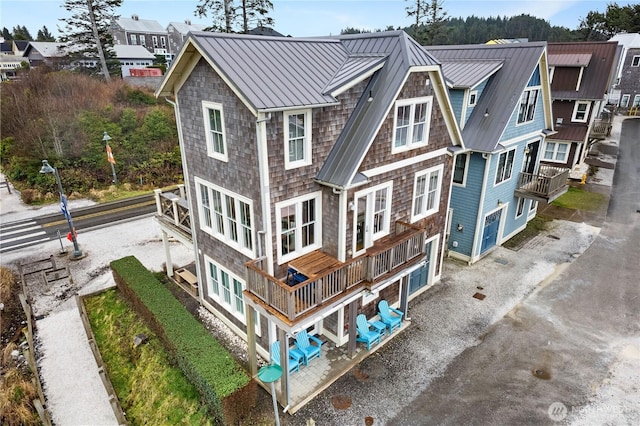 78 Pacifica Ln, Pacific Beach, WA 98571 - rear view of property with metal roof, a standing seam roof, and a residential view