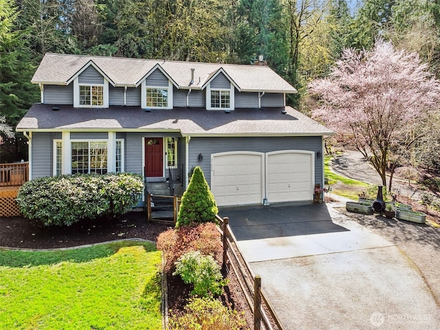 31000 186th Pl SE, Covington, WA 98042 - traditional-style house featuring an attached garage, concrete driveway, and roof with shingles