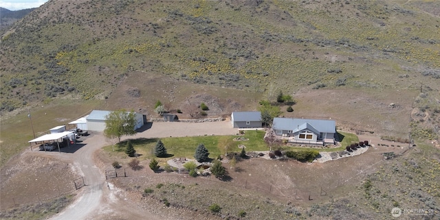 bird's eye view featuring a rural view and a mountain view