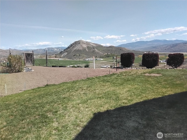 property view of mountains featuring a rural view