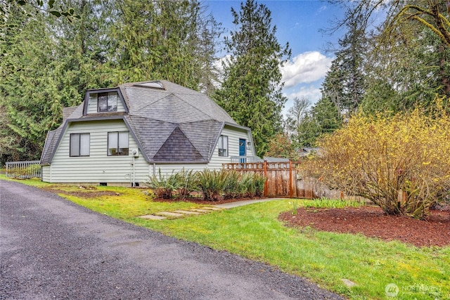 6455 NE Brigham Rd, Bainbridge Island, WA 98110 - view of side of property with roof with shingles