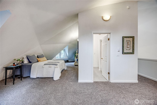 6455 NE Brigham Rd, Bainbridge Island, WA 98110 - carpeted bedroom featuring vaulted ceiling and baseboards