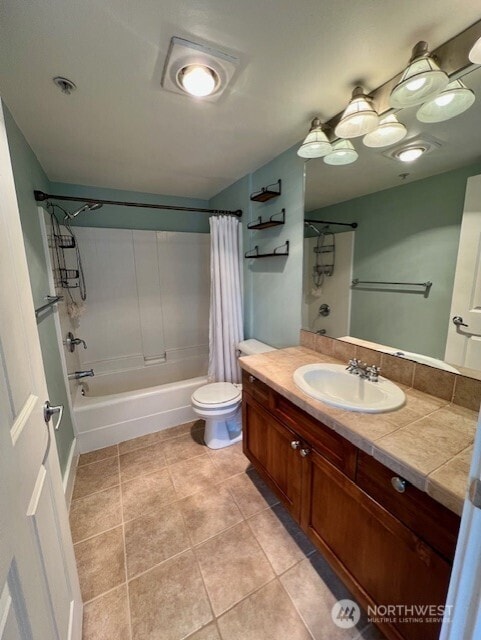 123 Queen Anne Ave N Unit 405, Seattle, WA 98109 - full bathroom featuring toilet, tile patterned floors, shower / tub combo, and vanity