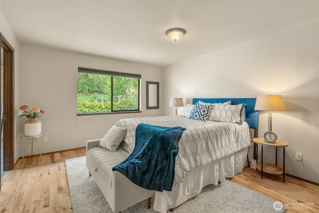 5510 3rd Ave NW, Seattle, WA 98107 - bedroom featuring wood finished floors and baseboards
