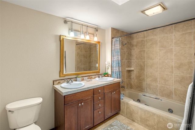 5510 3rd Ave NW, Seattle, WA 98107 - full bathroom with tiled shower / bath combo, double vanity, and toilet