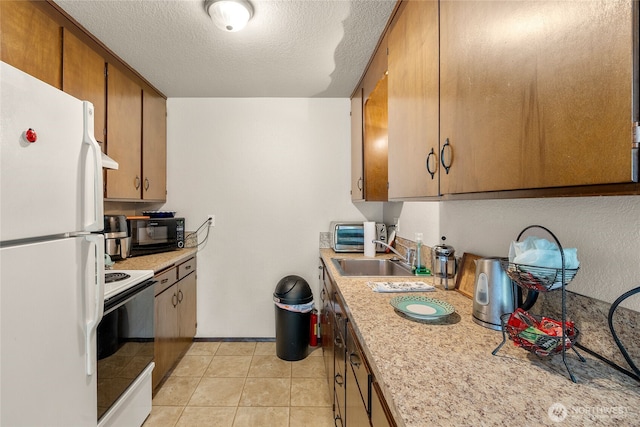 5510 3rd Ave NW, Seattle, WA 98107 - kitchen with white appliances, a sink, light countertops, a textured ceiling, and brown cabinetry