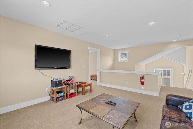 carpeted living area with recessed lighting, baseboards, and visible vents