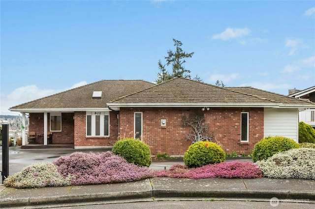 ranch-style home with brick siding