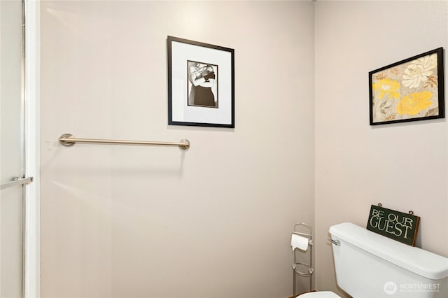 bathroom featuring toilet