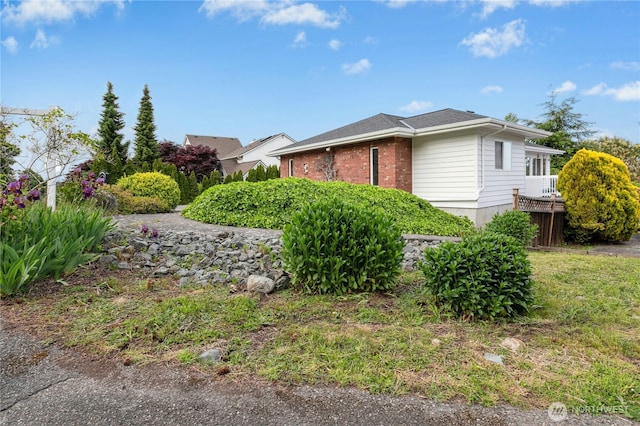 822 SW Fairhaven Ave, Oak Harbor, WA 98277 - view of side of property featuring brick siding