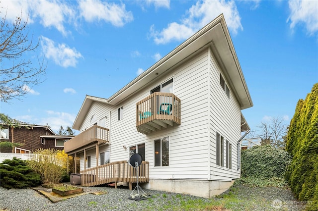 822 SW Fairhaven Ave, Oak Harbor, WA 98277 - rear view of property with a balcony