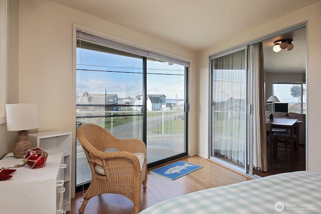 3545 Shell St, Greenbank, WA 98253 - bedroom featuring access to exterior and wood finished floors