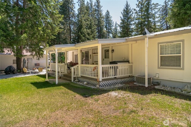 24502 Saddle St, Leavenworth, WA 98826 - view of front of home with a front lawn
