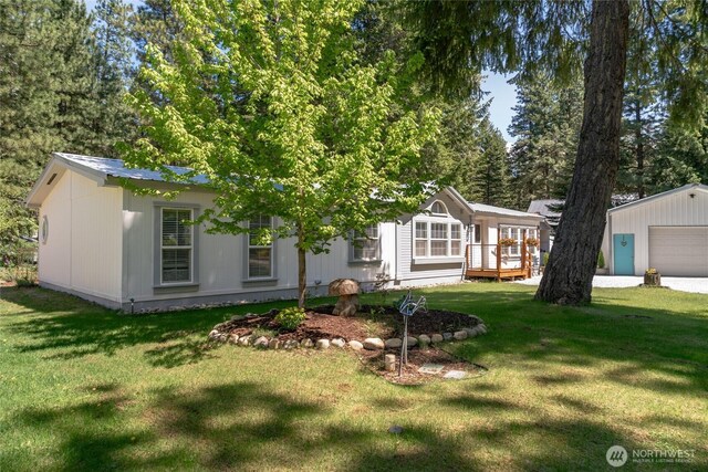 24502 Saddle St, Leavenworth, WA 98826 - view of front of property with a front yard and an outdoor structure