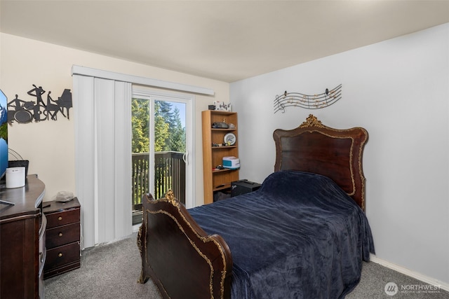 1425 S Puget Dr Unit 213, Renton, WA 98055 - bedroom with baseboards, carpet floors, and access to outside