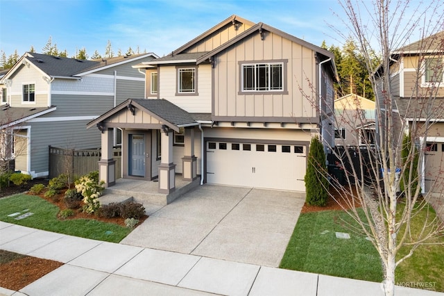 33140 Glacier Ave SE, Black Diamond, WA 98010 - view of front facade with board and batten siding, concrete driveway, a garage, and fence