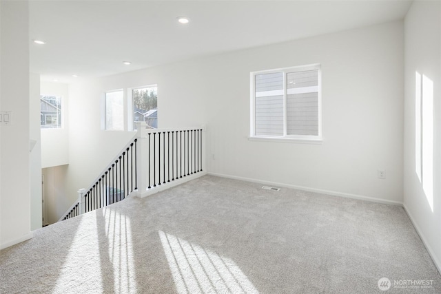 33140 Glacier Ave SE, Black Diamond, WA 98010 - unfurnished room with baseboards, visible vents, carpet floors, and recessed lighting