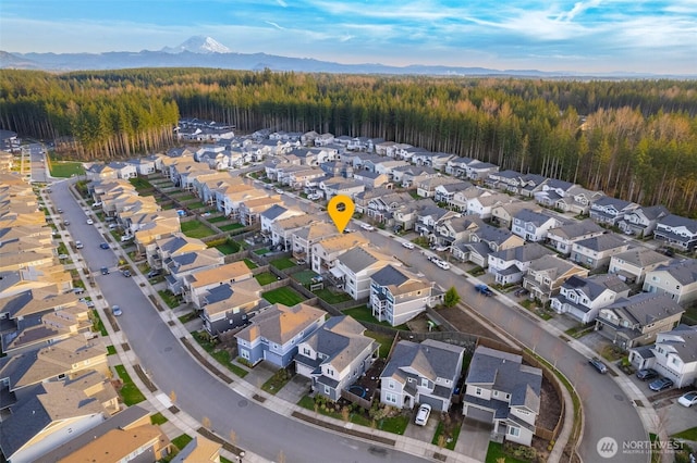 33140 Glacier Ave SE, Black Diamond, WA 98010 - birds eye view of property featuring a residential view, a wooded view, and a mountain view
