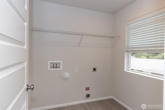 clothes washing area with laundry area, hookup for a washing machine, baseboards, wood finished floors, and hookup for an electric dryer