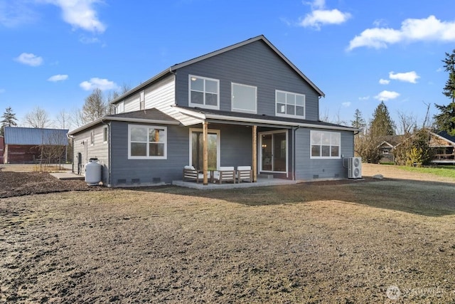 back of property featuring a patio area and crawl space