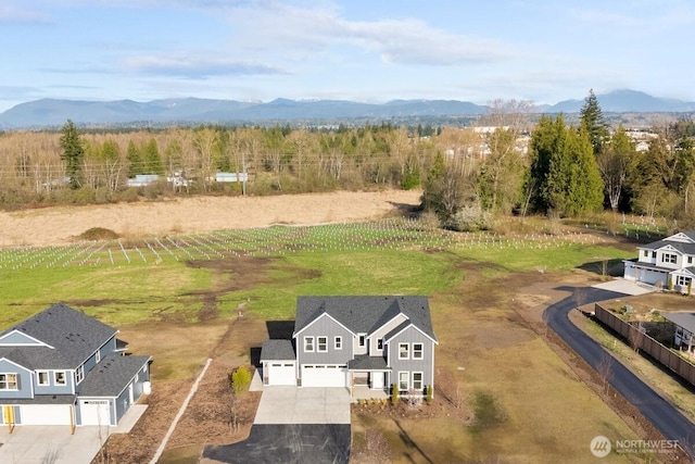 bird's eye view with a rural view and a mountain view