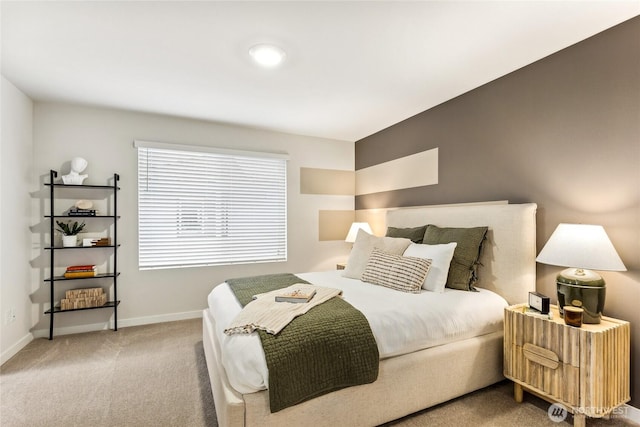 carpeted bedroom with baseboards