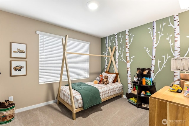 bedroom with baseboards and carpet
