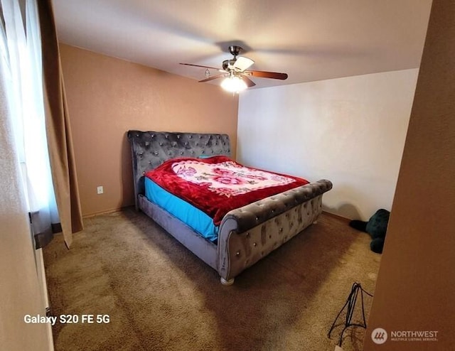 carpeted bedroom featuring a ceiling fan