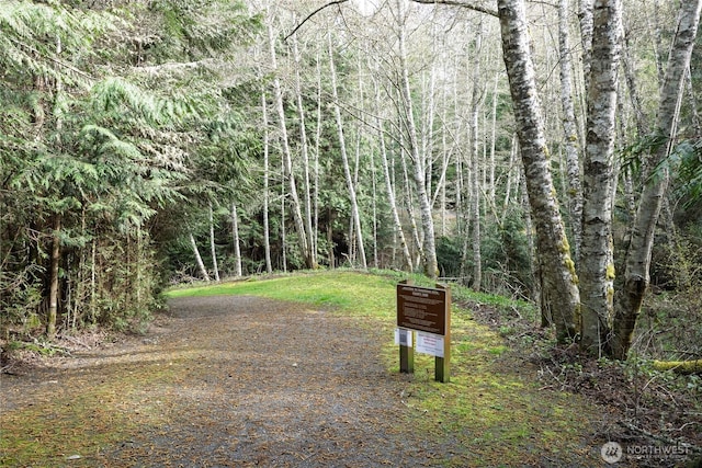 exterior space featuring a view of trees