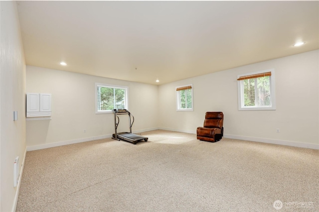 workout area with light carpet, baseboards, and recessed lighting